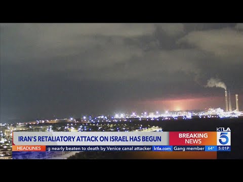 Booms and sirens in Israel after Iran launches over 200 missiles and drones in unprecedented attack