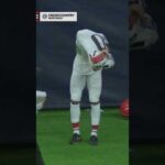 Greg Newsome II gives a fan his jersey