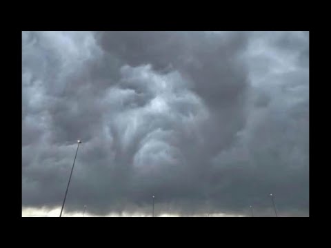 Man face with Afro appears in clouds @ Denver Airport 👀